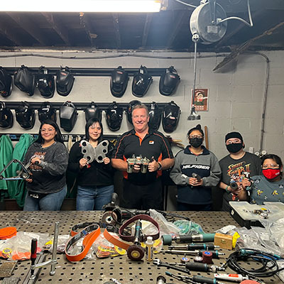 Welding students using Dynabrade tools