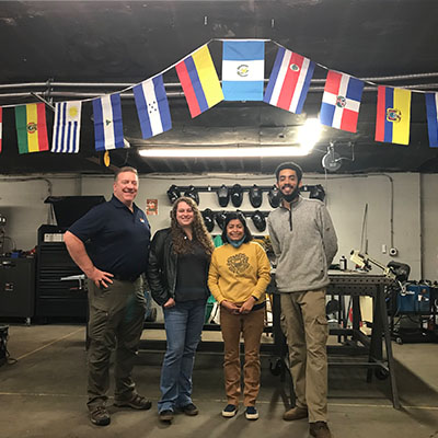 Welding students with Dynabrade employees